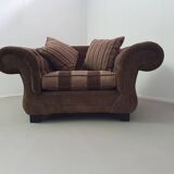 Large weighty love seat with the original matching cushions. Marked "Handmade in Holland"