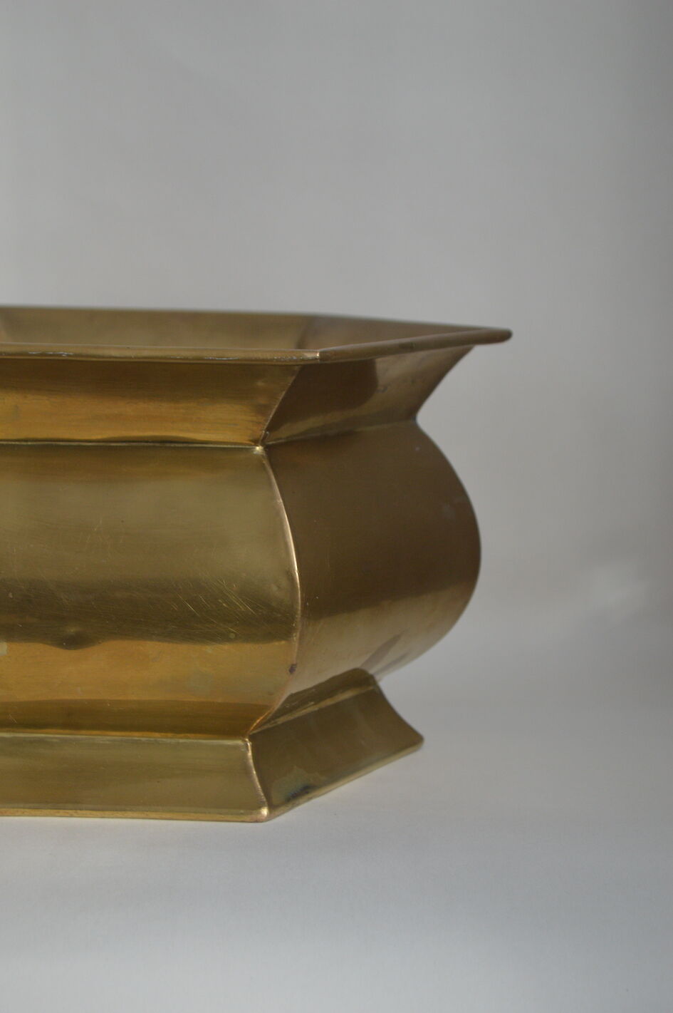 Brass pot cover