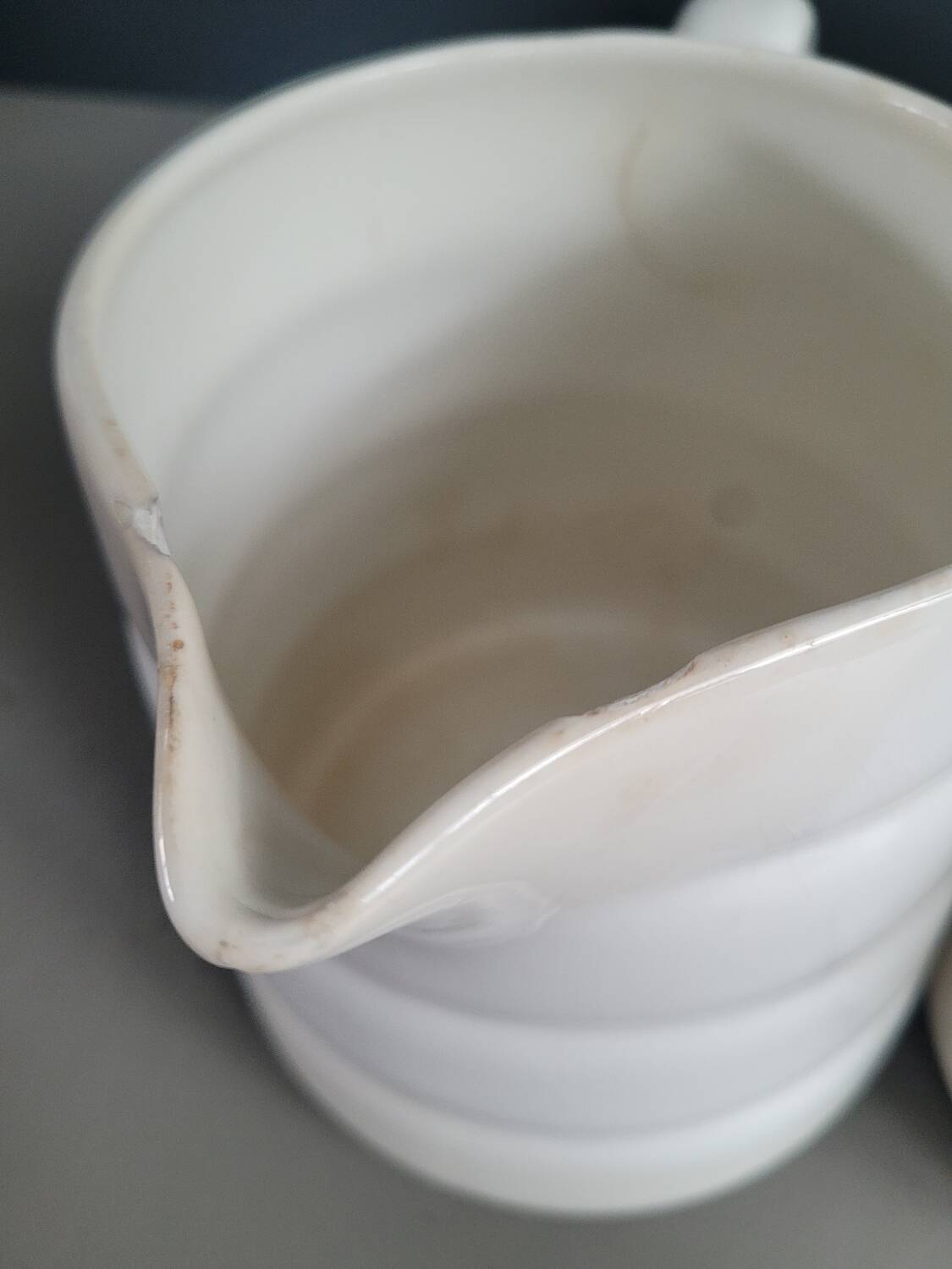 Pair of antique Gien porcelain pitchers