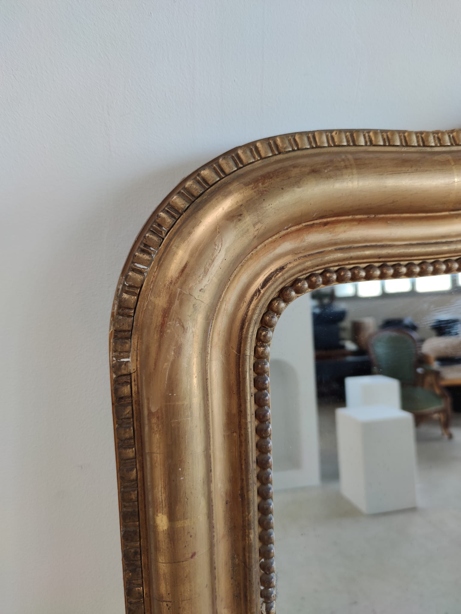 Louis Philippe gilded mirror with gendarme hat nineteenth H:130cm