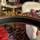 Set of four Napoleon III chairs in black lacquered wood with gold highlights.