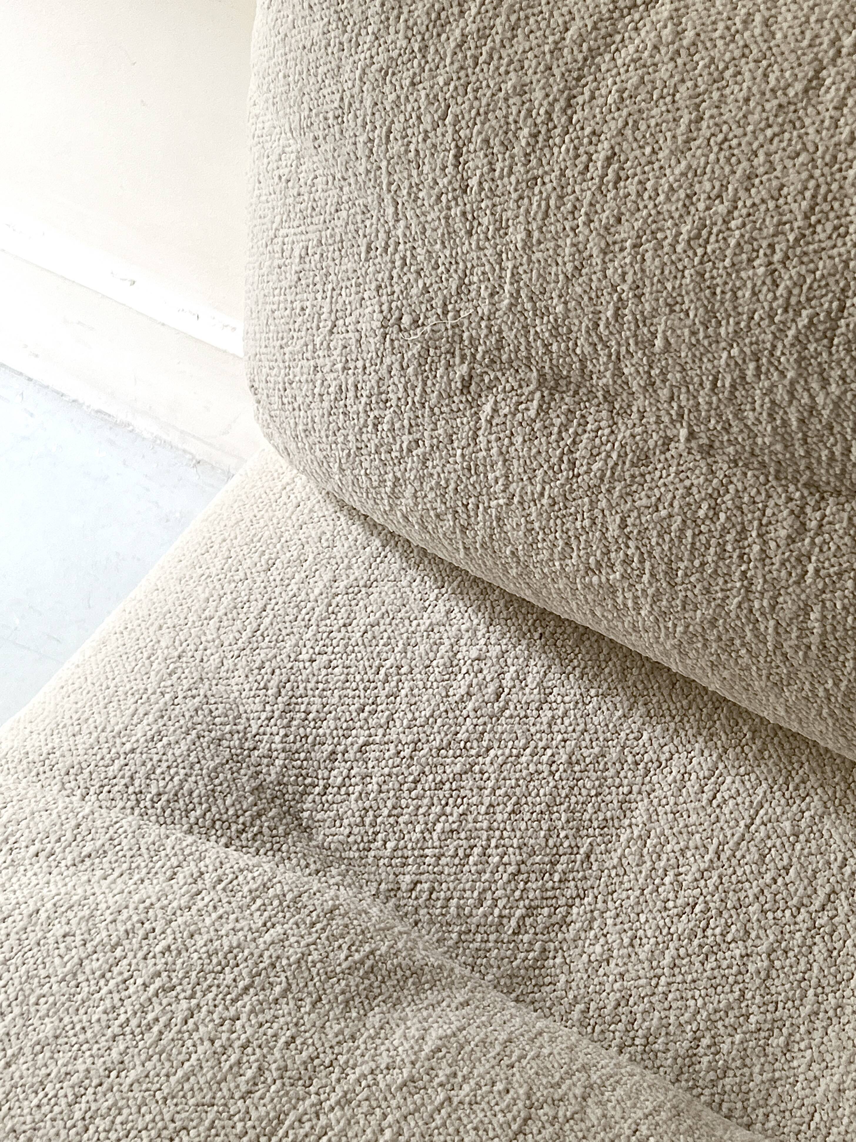 Italian off-white chenille armchair with a wooden base, 1970s design.