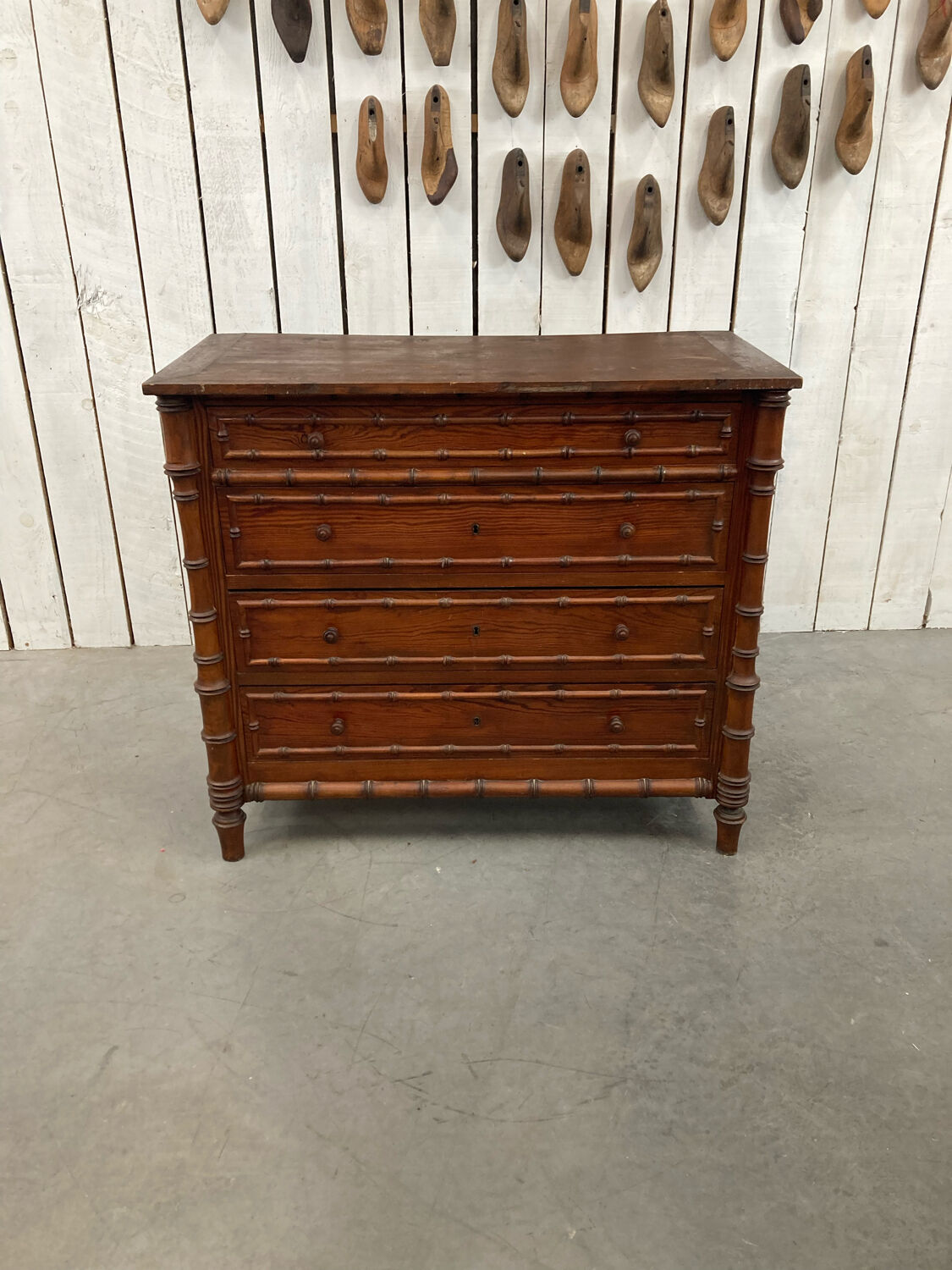 Old wooden chest of drawers imitation bamboo