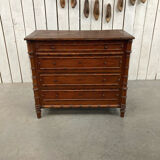 Old wooden chest of drawers imitation bamboo