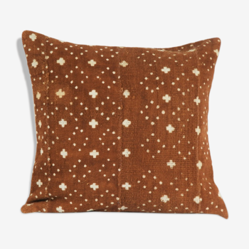 Rust-coloured Bogolan cushion