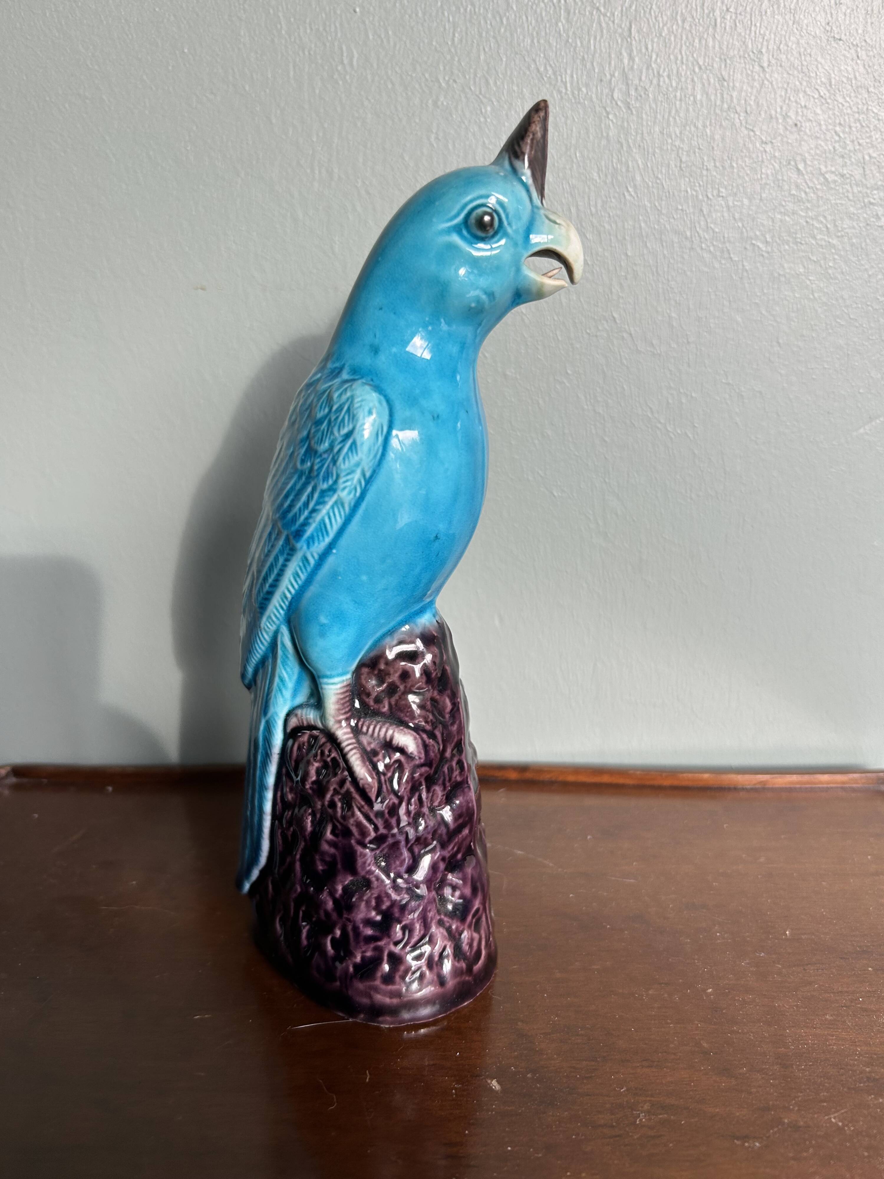 Porcelain parrot statuette