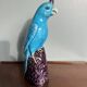 Statuette perroquet en porcelaine