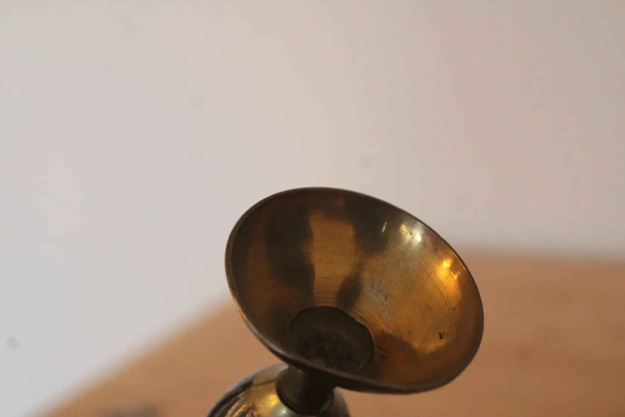 Vintage brass soliflore vase with black, red, and green floral decoration – H 18 cm
