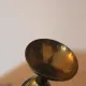 Vintage brass soliflore vase with black, red, and green floral decoration – H 18 cm