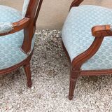 Paire de fauteuils médaillon style Louis XVI