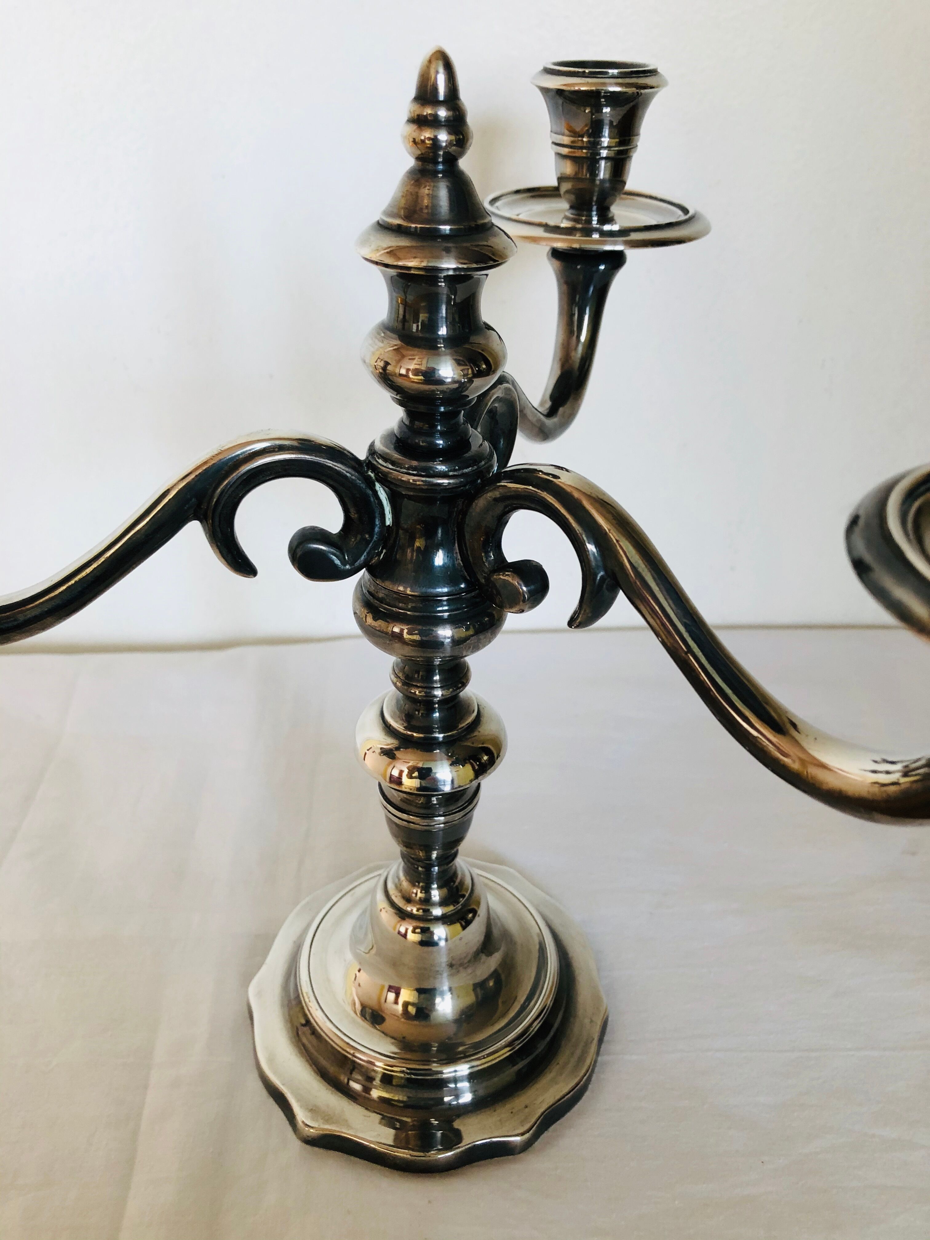 Pair of silver metal candlesticks