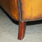 Vintage Chesterfield serpentine luxury sofa in restored leather