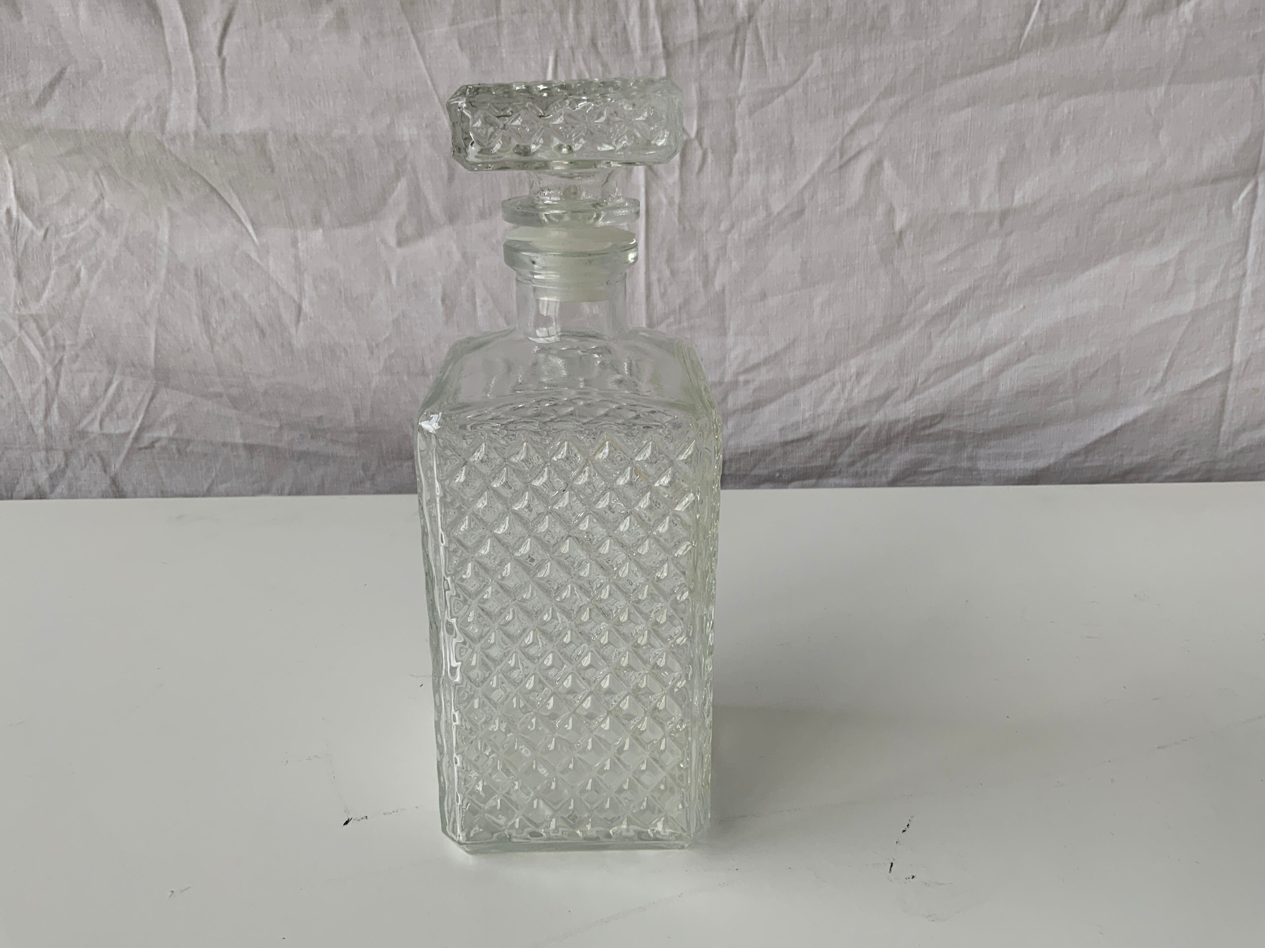 Selency whisky decanter x Monoprix cross Laroche