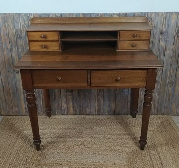 Wooden desk with turned feet