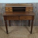 Wooden desk with turned feet