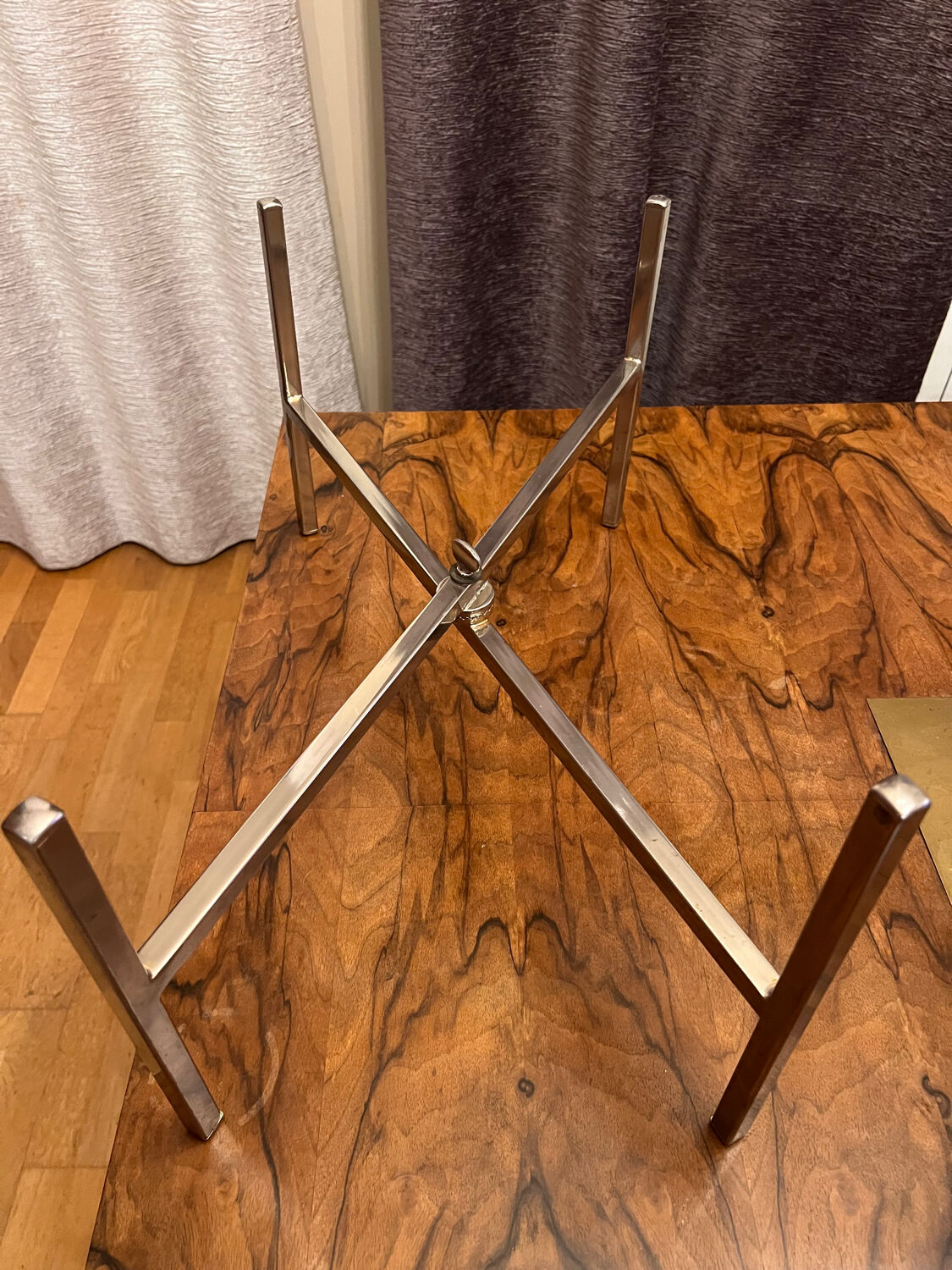 Small chrome and glass coffee table.