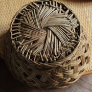 Vintage high round wicker basket with openwork.