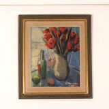 Bouquet rouge et bouteille de vin