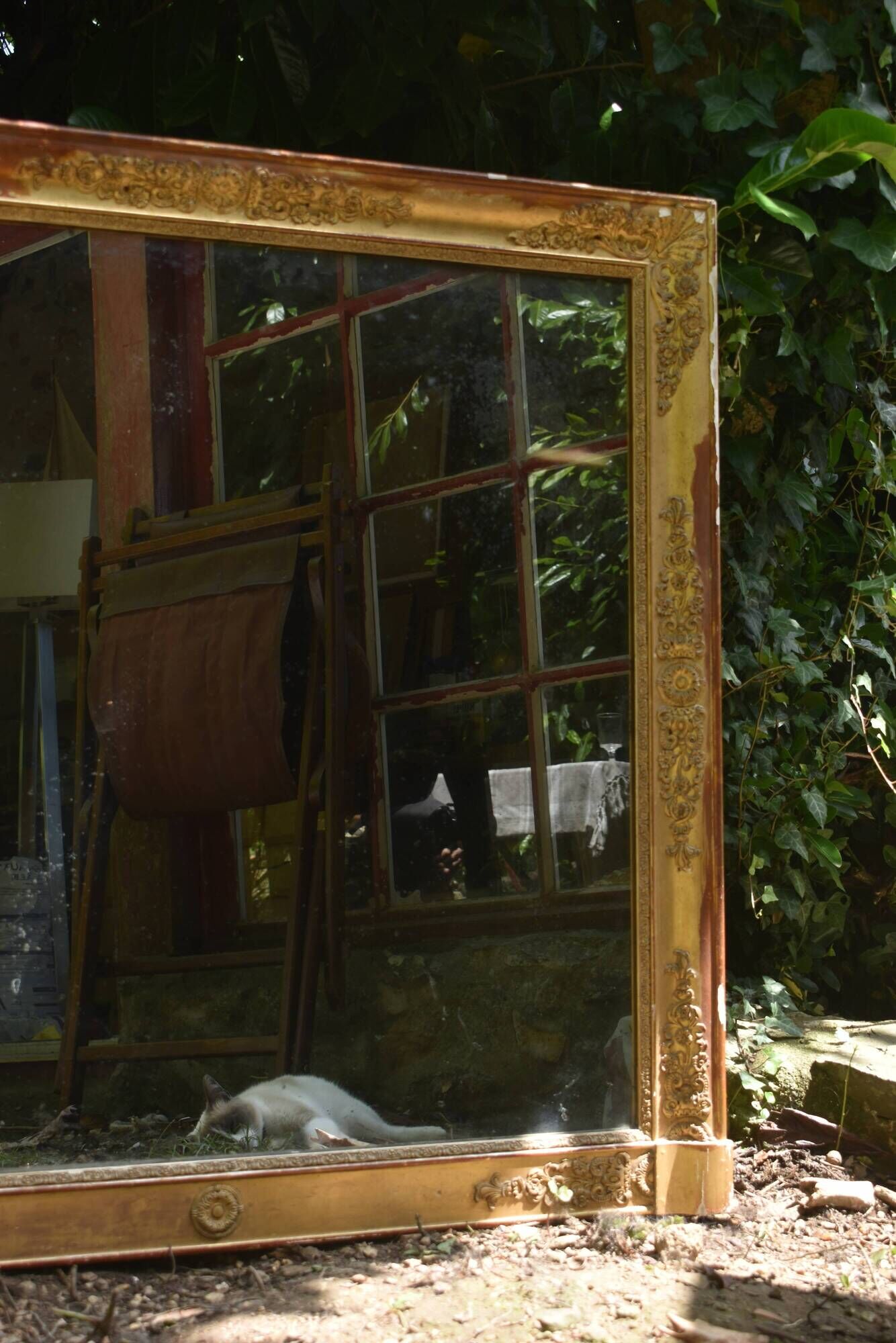 Large gilded Empire mirror from the 19th century.