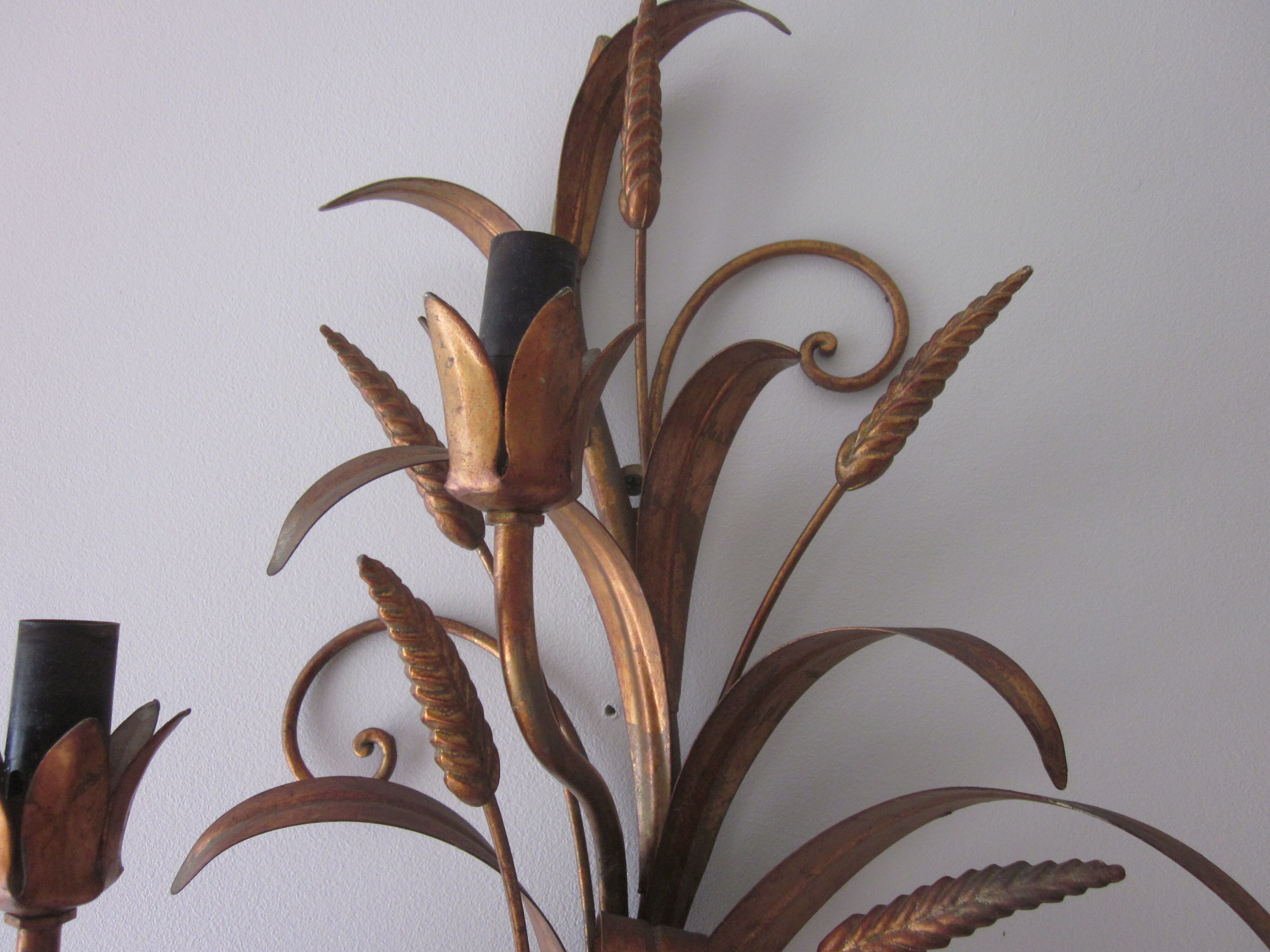 Sconce in gilded metal