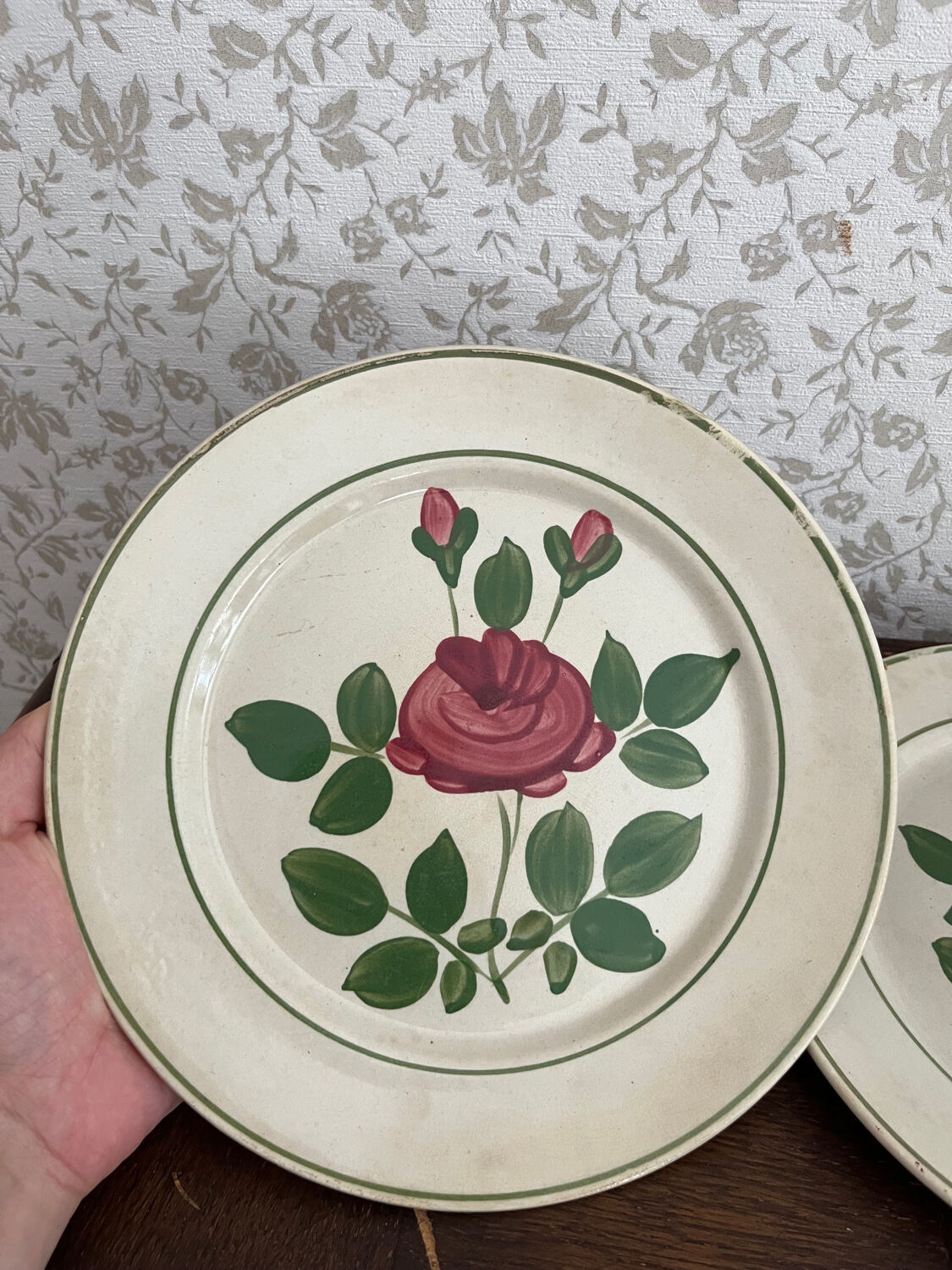 Two pink earthenware plates