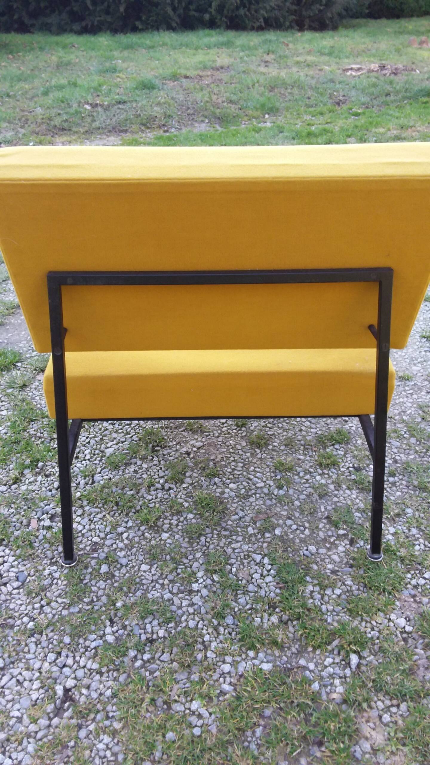 Vintage 50s armchair with black metal base and fabric seats