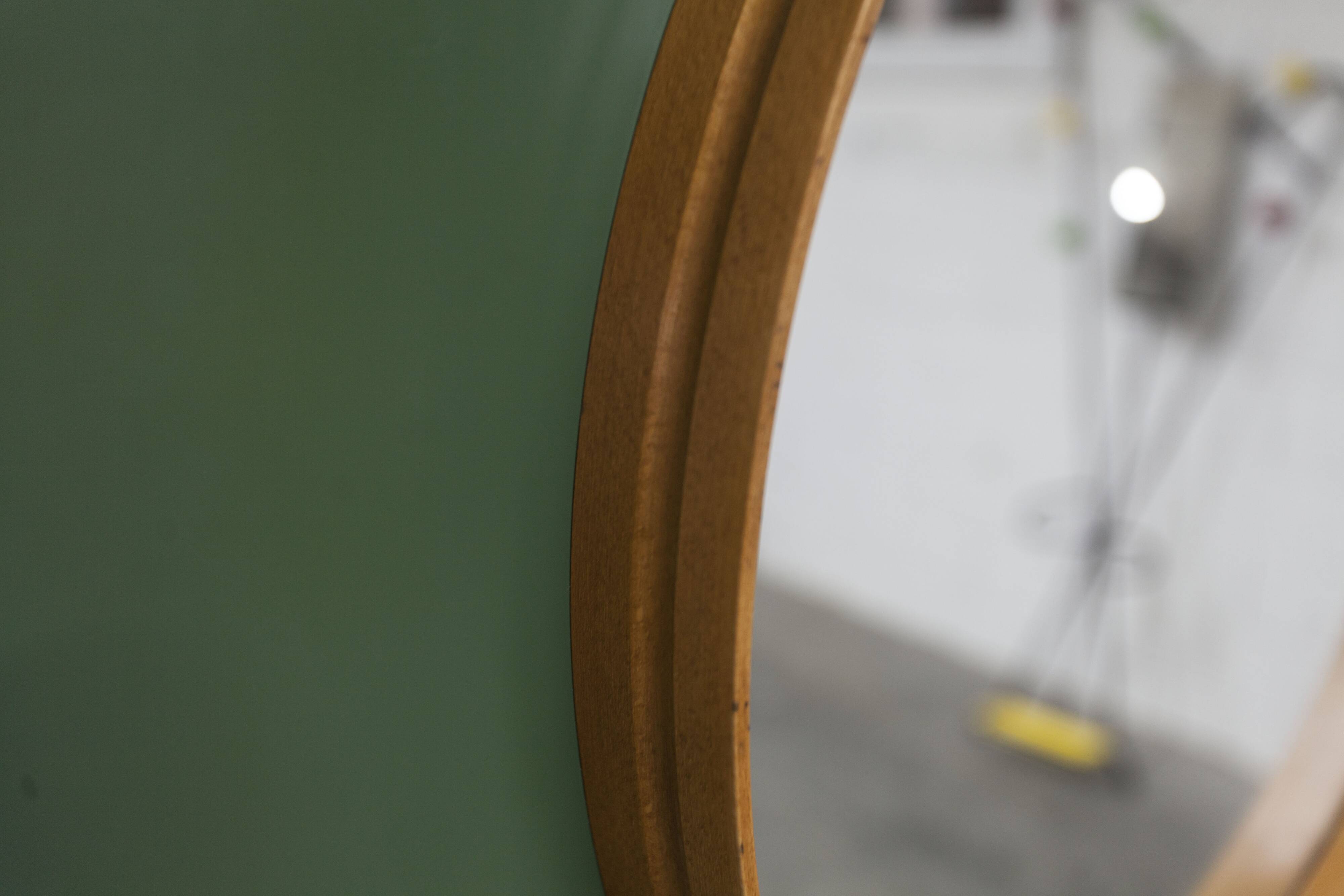 Unusual round wall mirror 60 cm teak edge on green rectangular board 1960.