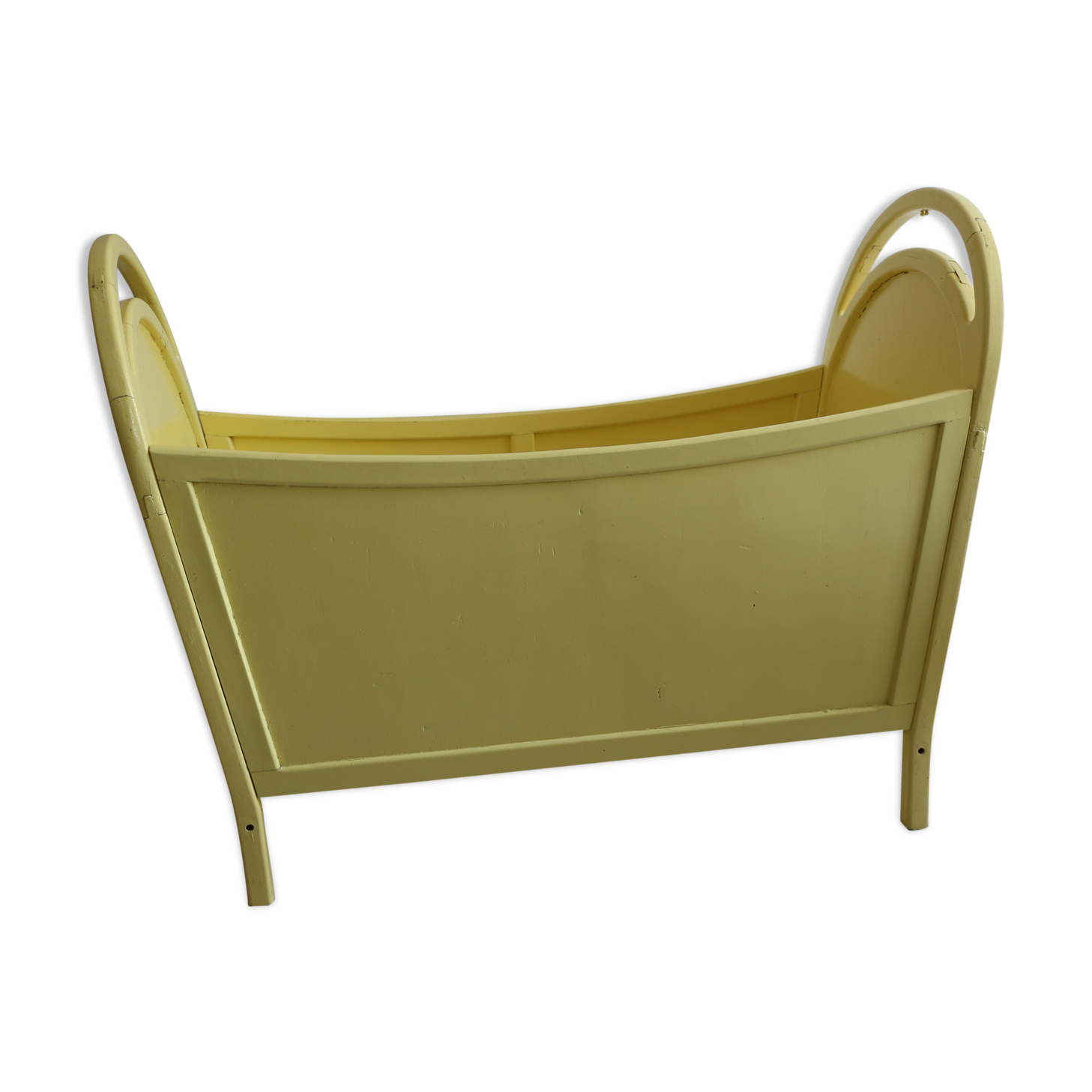 Yellow vintage baby cot