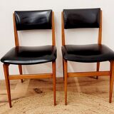 Six vintage wooden chairs and black Skaï