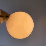 Old inclined wall lamp in opaline and ceramic