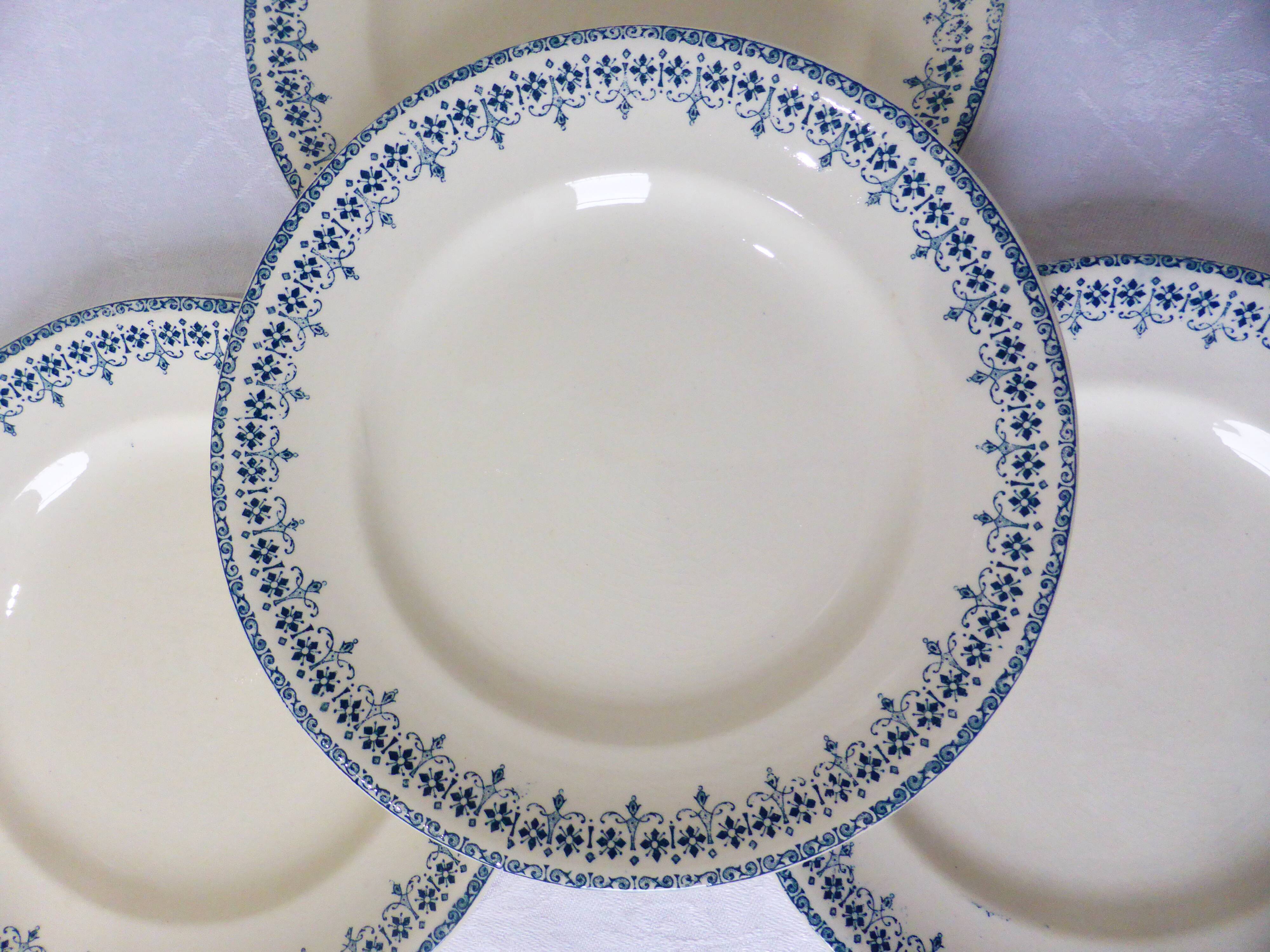 4 vintage dessert plates of Longwy