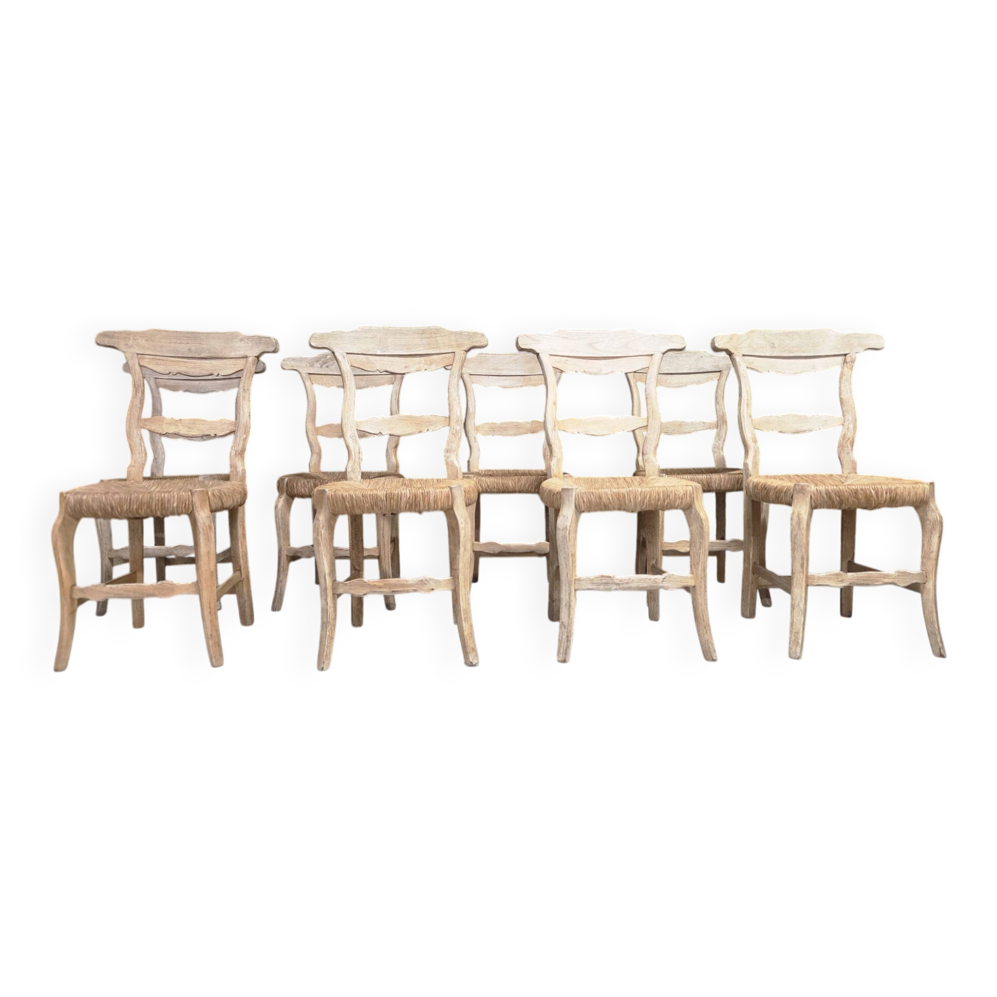 8 rustic oak chairs with patina, straw seating, 1950s.
