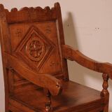 high-backed armchair from the 17th century in oak