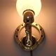 Gilded bronze wall lamp with iron and horse head 1950/1960.