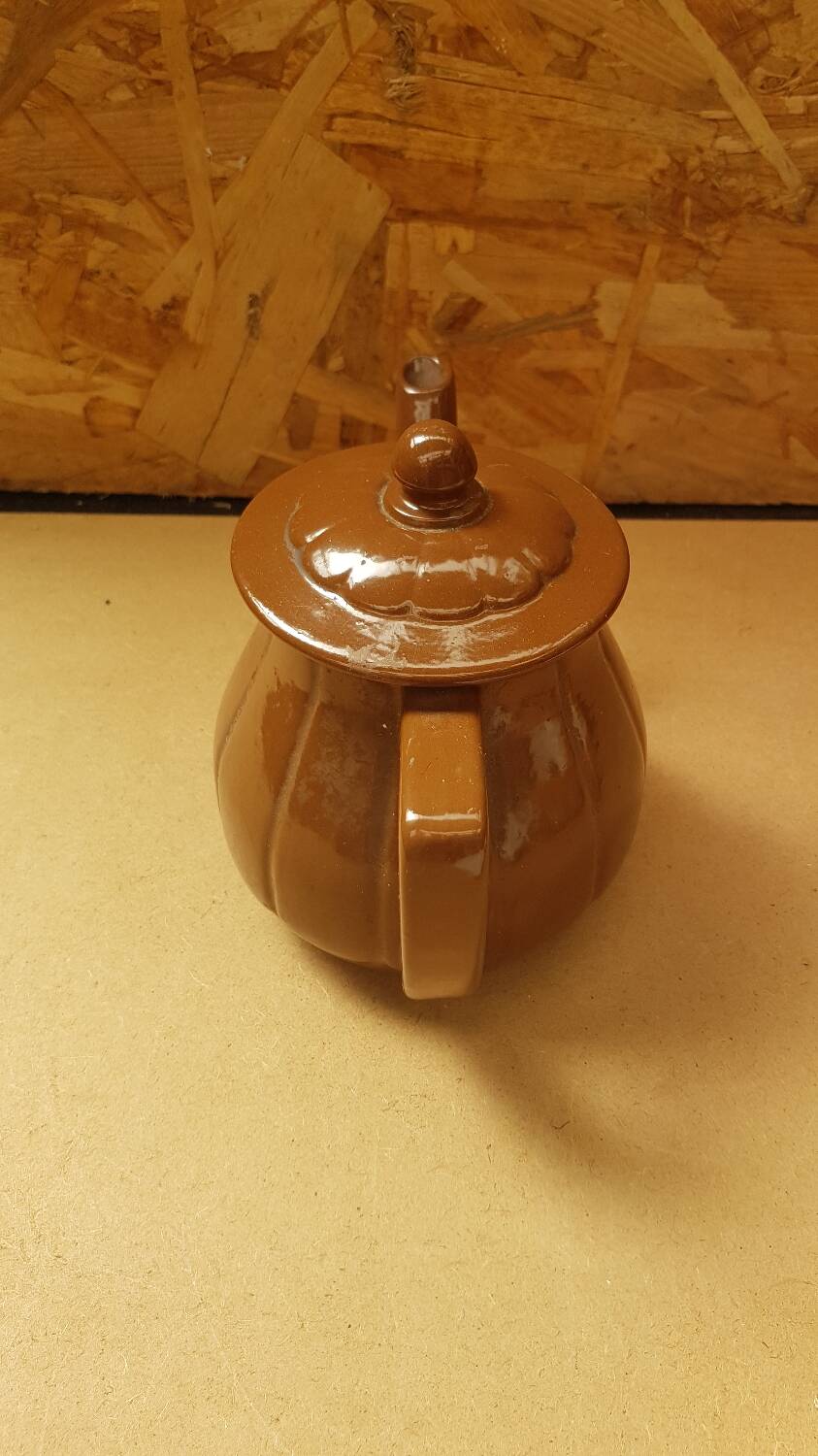 Old vintage brown ceramic romeo teapot