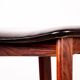 4 Danish high stools, rosewood and black leather, Knud Bent for Dyrlund.