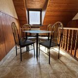 Table et 4 chaises en laiton et bois noir, années 1970