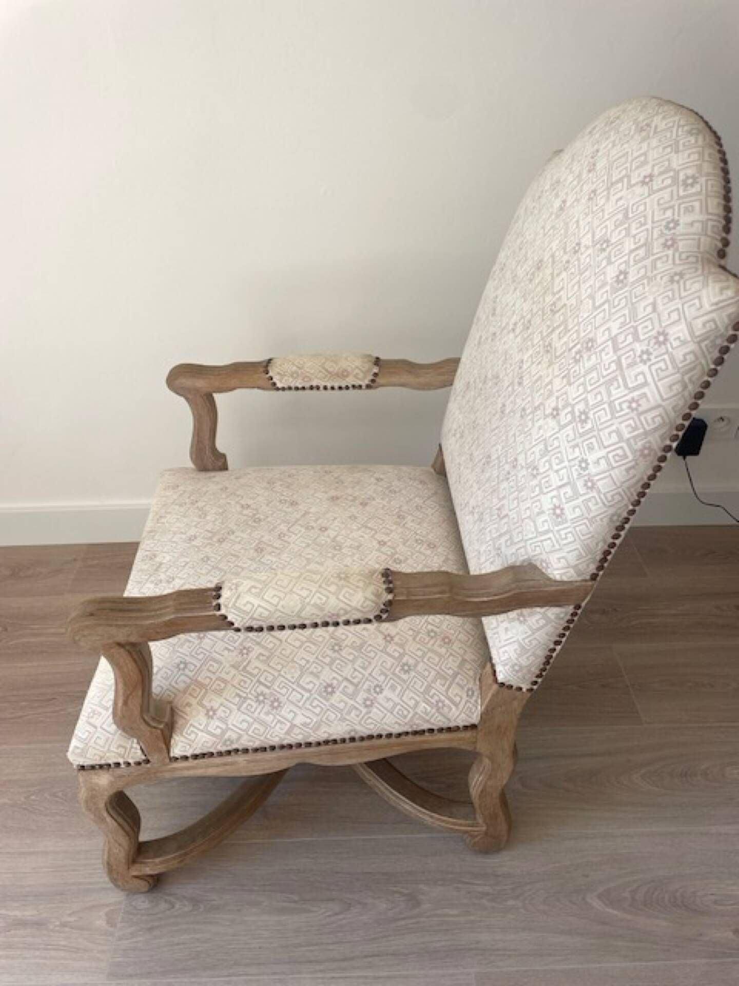 Low armchair in Louis XV style