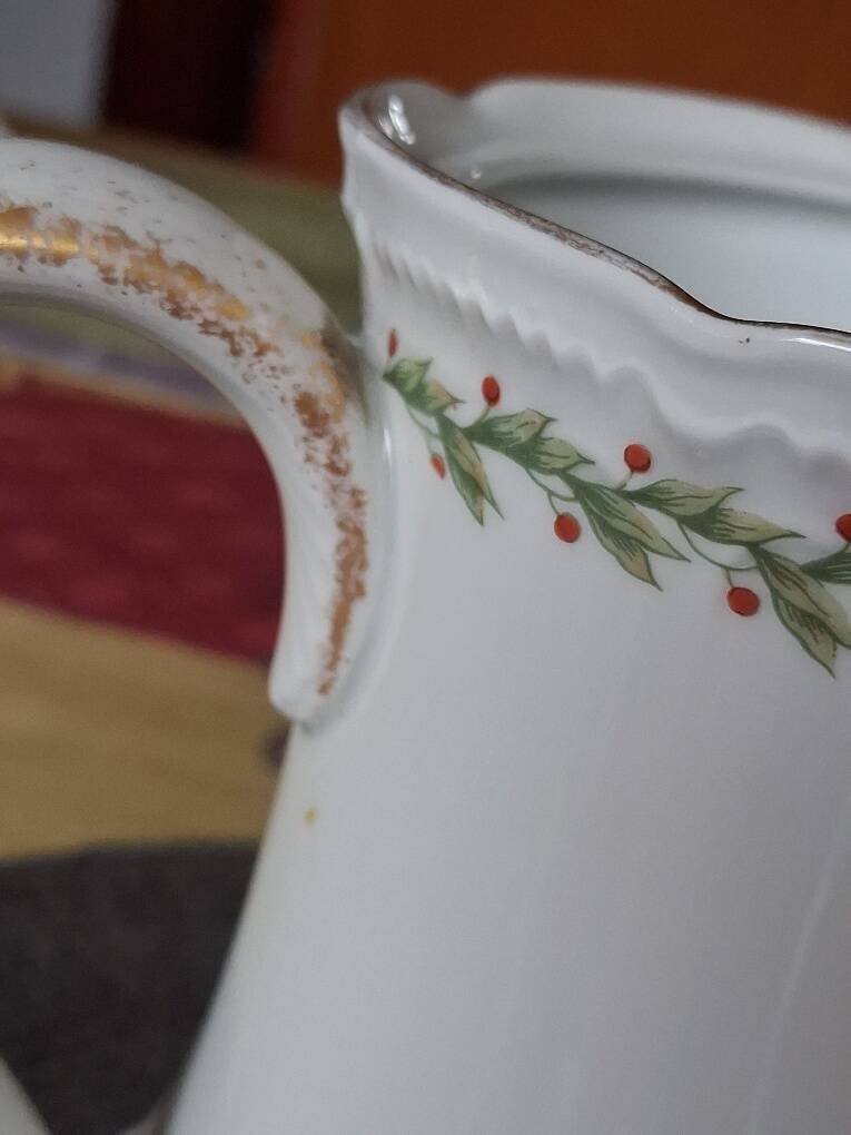 Old coffee pot / teapot in Limoges porcelain
