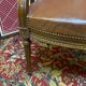 Fauteuil de bureau vintage en bois et cuir marron clouté