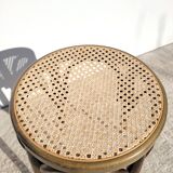 Low stool in cane and curved wood