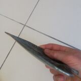 Greenish metal leaf pocket emptier