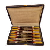 12 Bakelite cheese knives 1940