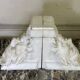 Pair of white statuary marble consoles, with faun heads
