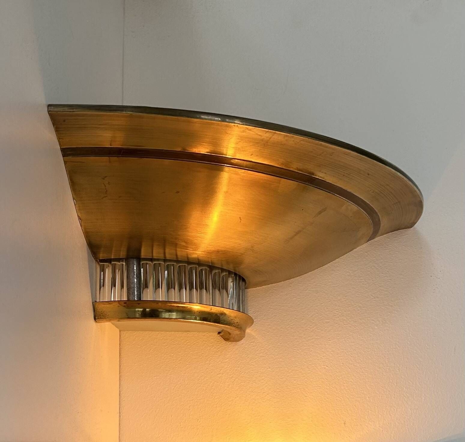 Pair of Art Deco corner sconces, brass and glass, France 1930