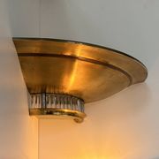 Pair of Art Deco corner sconces, brass and glass, France 1930