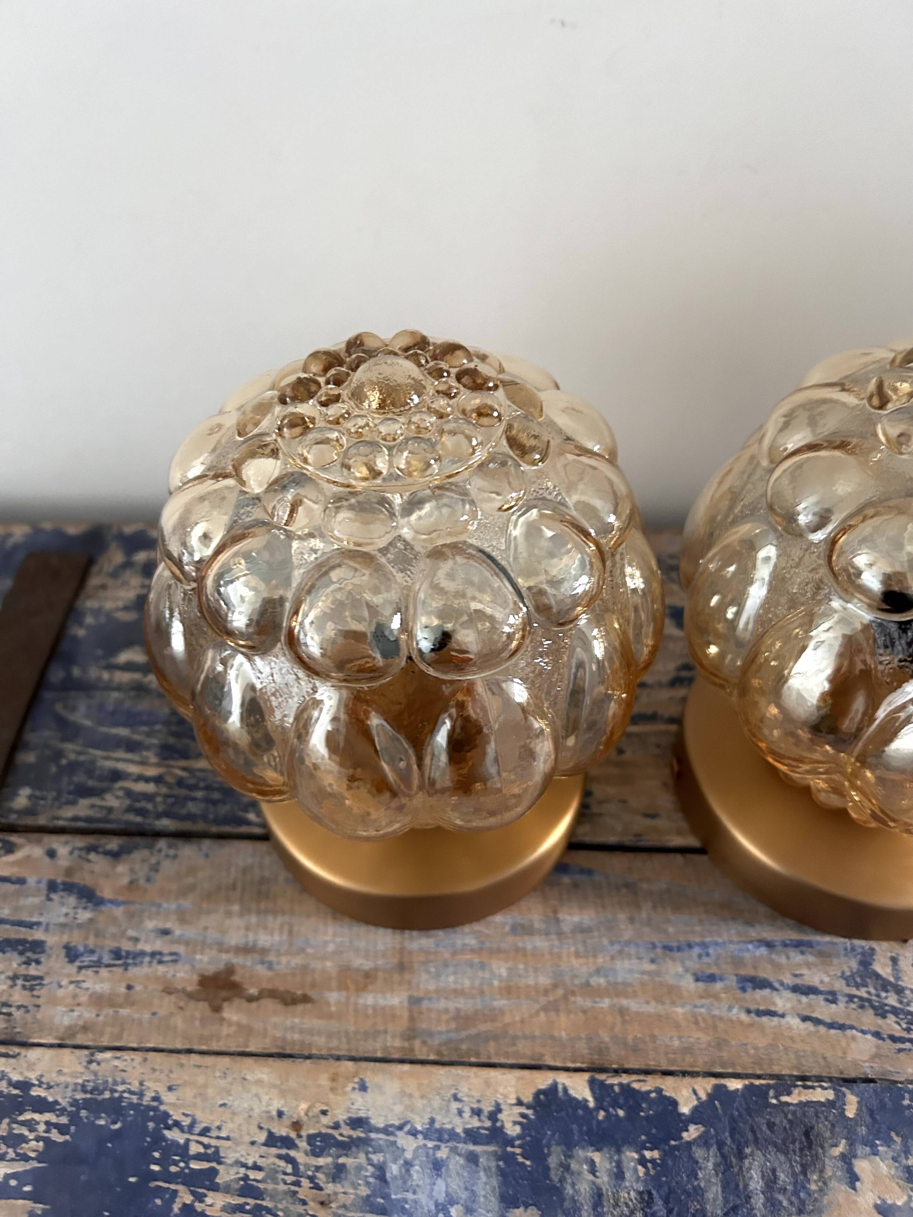 Pair of Scandinavian golden globe wall lights