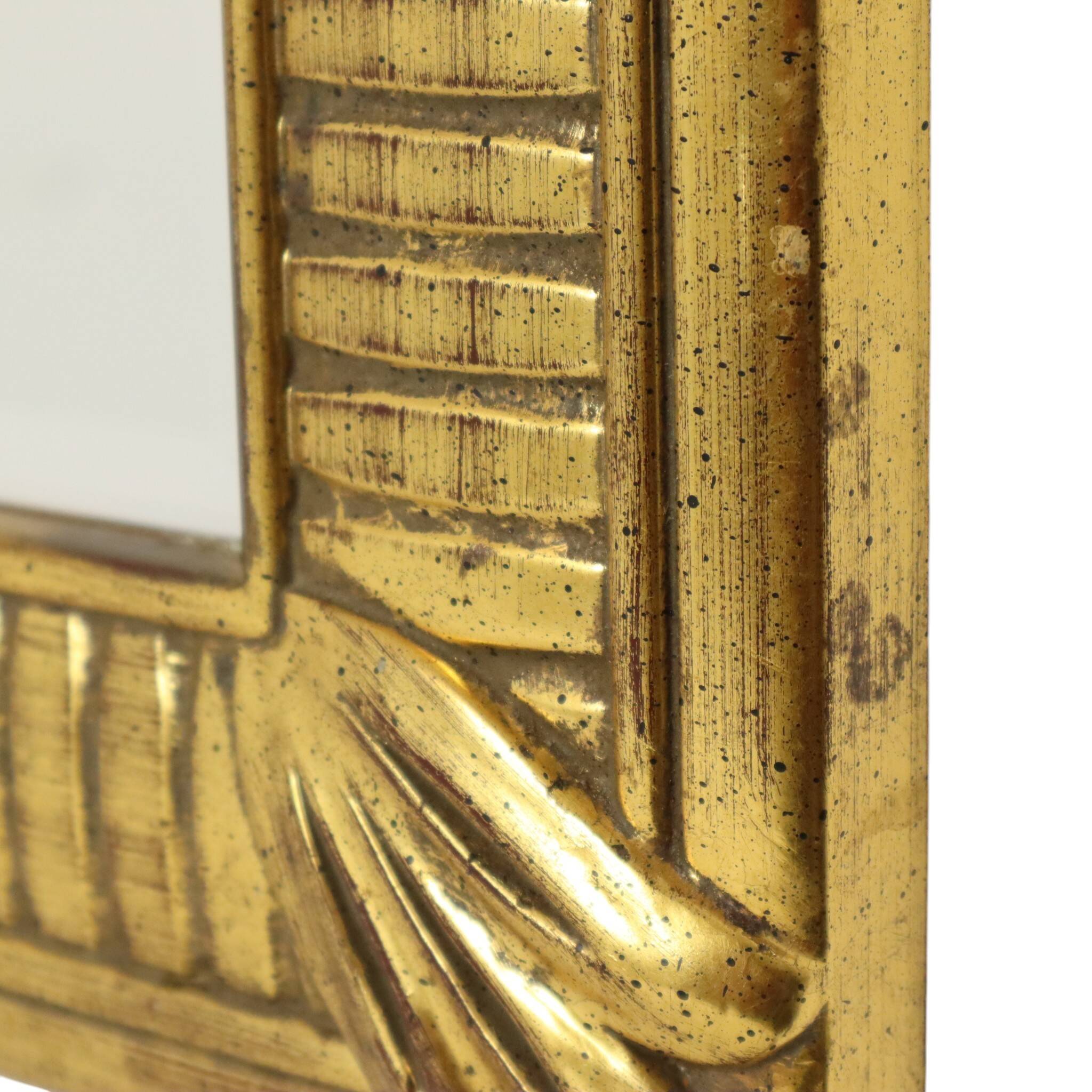 Miroir Deknudt en or Hollywood Regency biseauté 92 cm