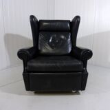 Black leather wingback chair on wheels 1960’s