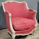 Very large curved Louis XV style bergere chair in lacquered wood